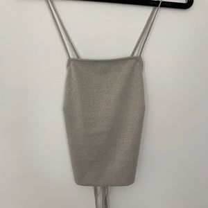 Silver tank with open back
